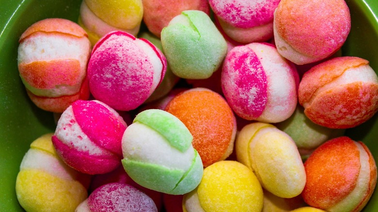 freeze dried Skittles in green bowl