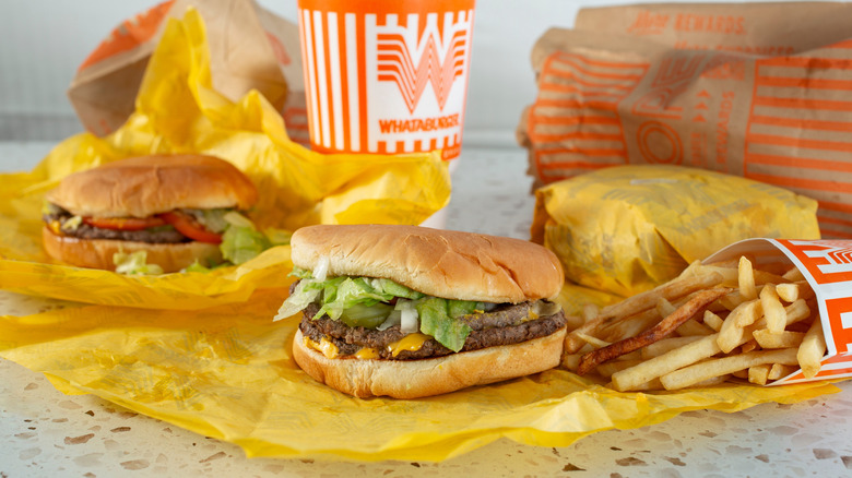 Whataburger items unwrapped on a restaurant table