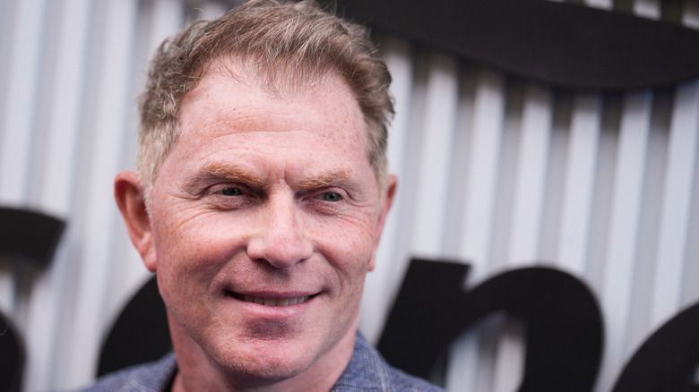 A close-up of Bobby Flay smiling.