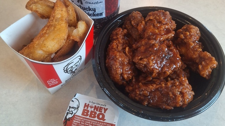KFC Honey BBQ Wings, sauce, and potato wedges