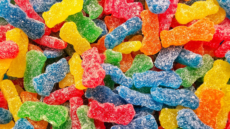Sour Patch kids with sour sanding on them