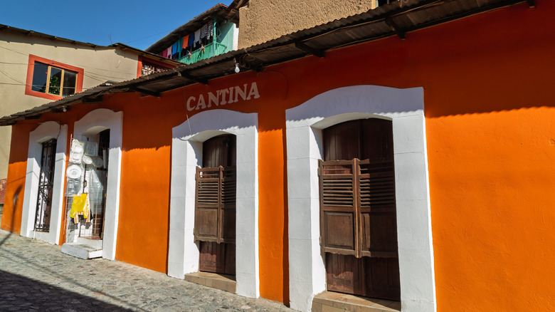 Outdoor view of an orange and white cantina