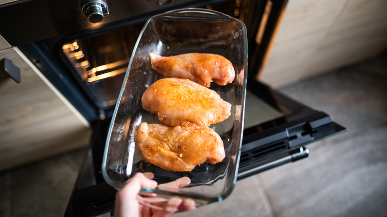 chicken placed in oven