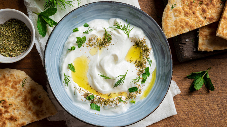 A bowl of Greek yogurt with olive oil
