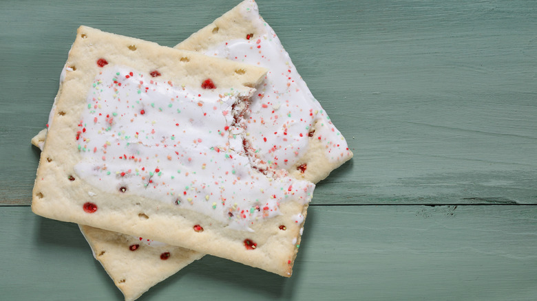 Two strawberry Pop-Tarts on a surface