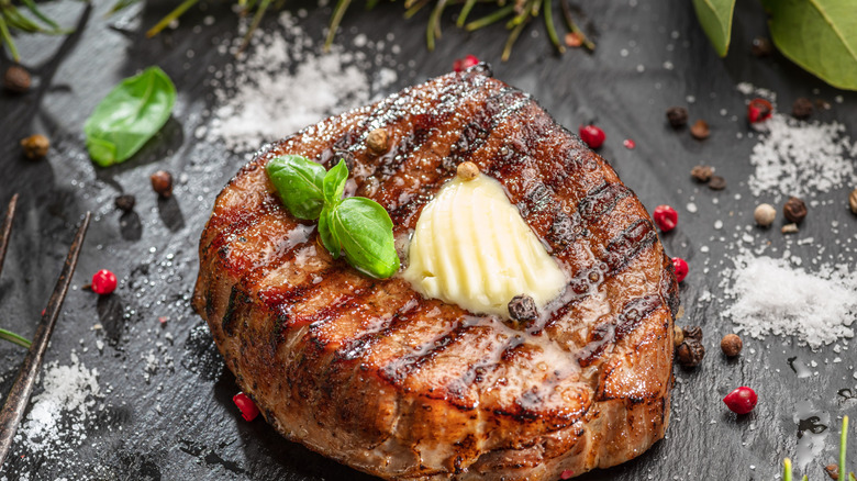 grilled ribeye with melting butter on top