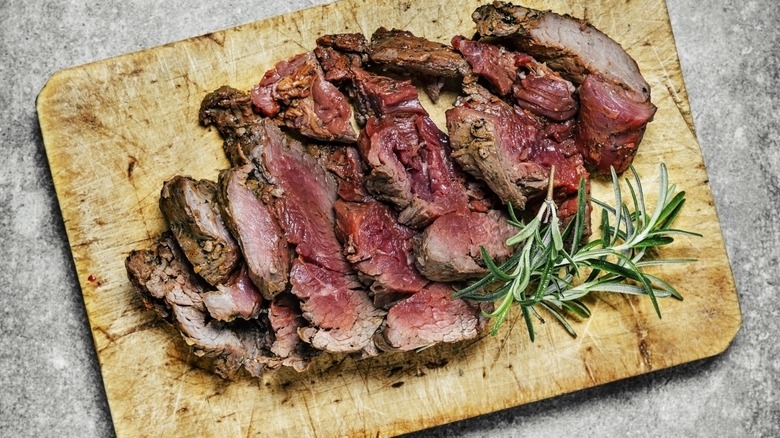 rare steak on platter