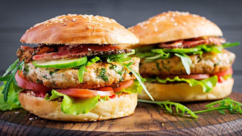 Turkey burgers on wooden board