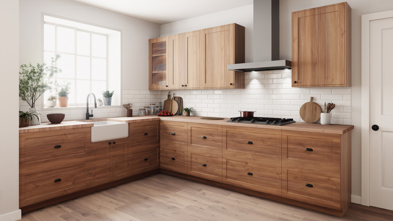 modern kitchen with wood-tone finish cabinets