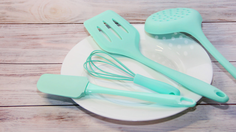 mint green silicone kitchen utensils