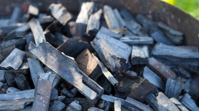 Natural lump charcoal in a home grill