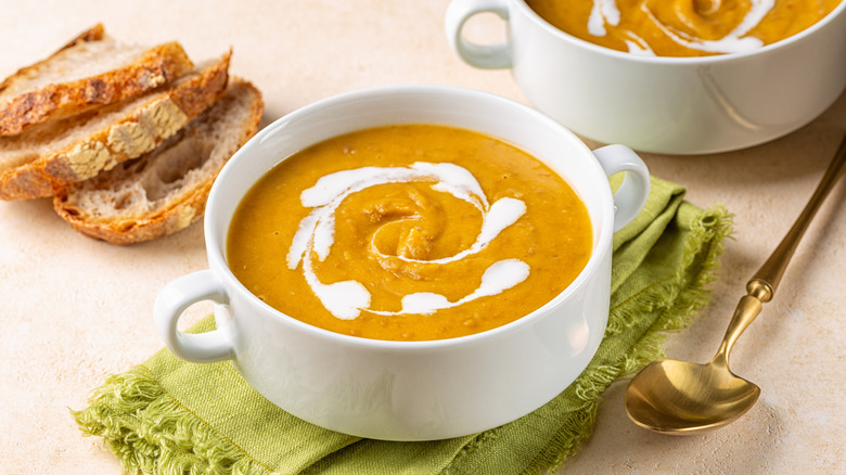 Bowl of soup topped with cream