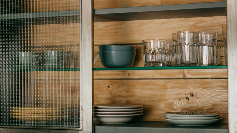 Glassware in cabinet
