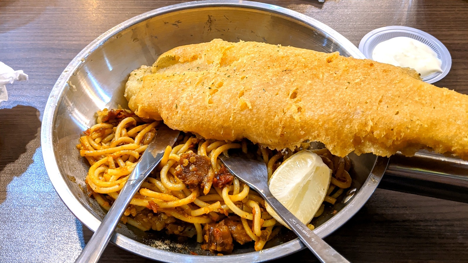 Where Did The Pairing Of Fried Fish And Spaghetti Originate?