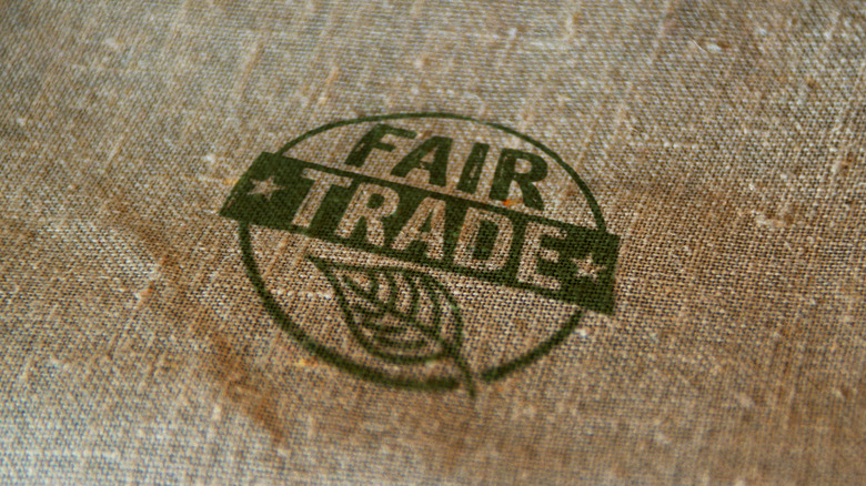 Fairtrade logo printed on raw canvas.
