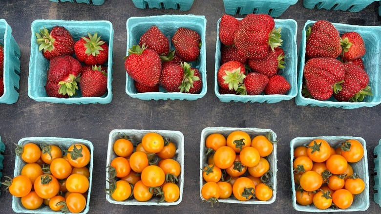 Strawberries and tomatoes for sale at Brunswick-Topsham Land Trust Farmers' Market in Brunswick