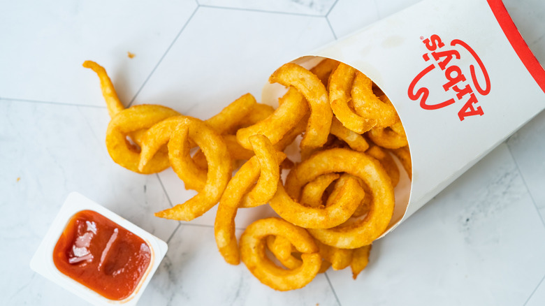Arby's curly fries with ketchup