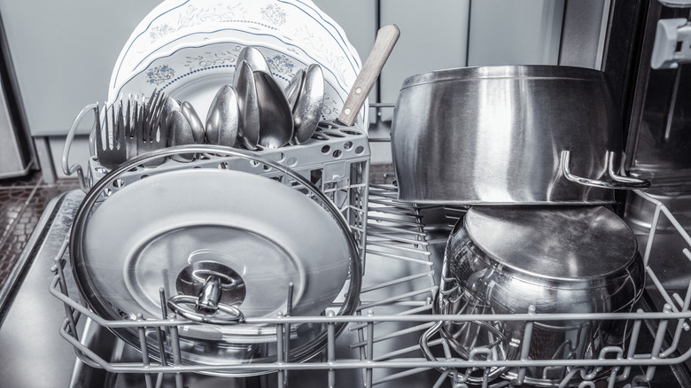 Heavy pots positioned correctly on the dishwasher's lowest rack