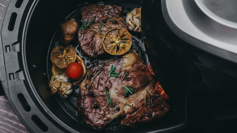 steak in air fryer with lemon and herbs