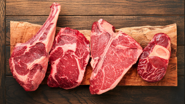 Thick cuts of steak on a cutting board