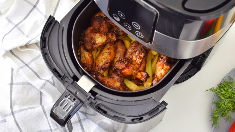 Air fryer with open basket