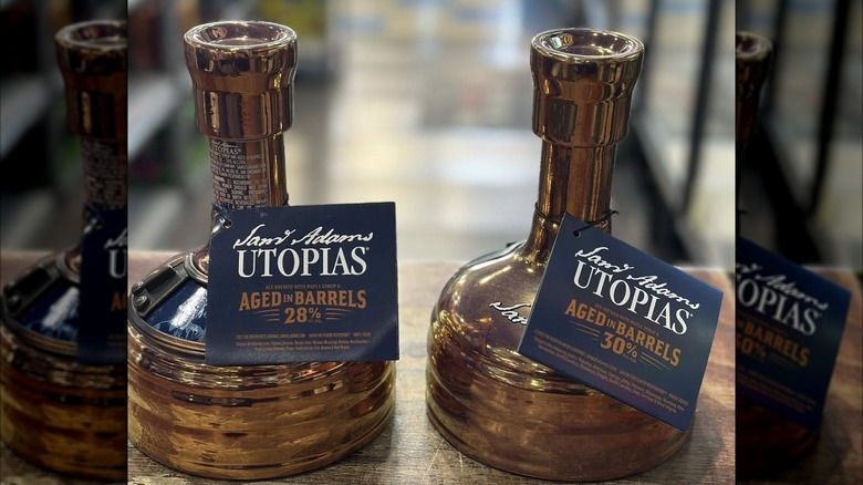 Two bottles of Samuel Adams Utopias, from different years