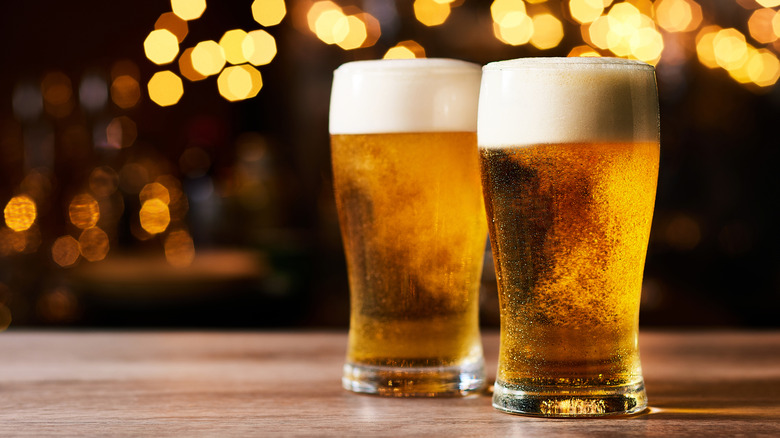 Two pint glasses of beer