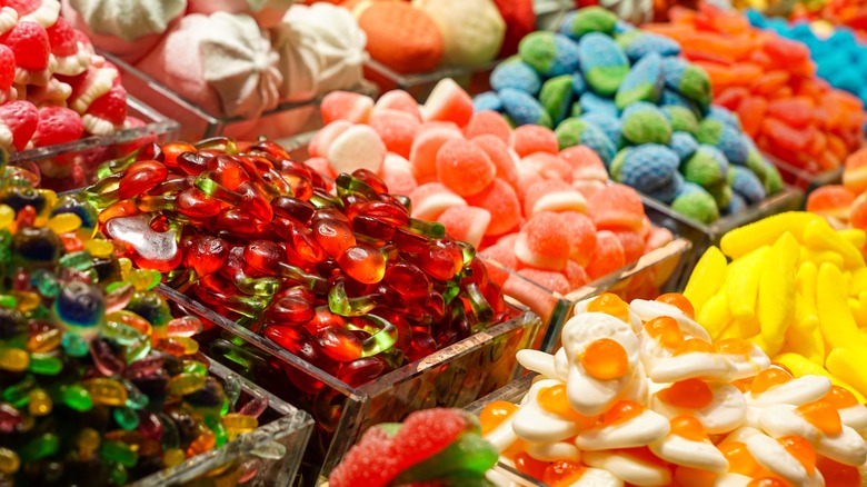 display of various candies in containers