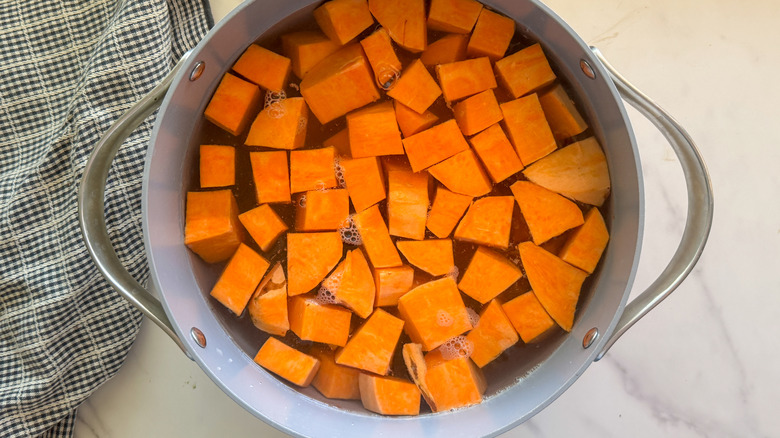 sweet potatoes in pot of water
