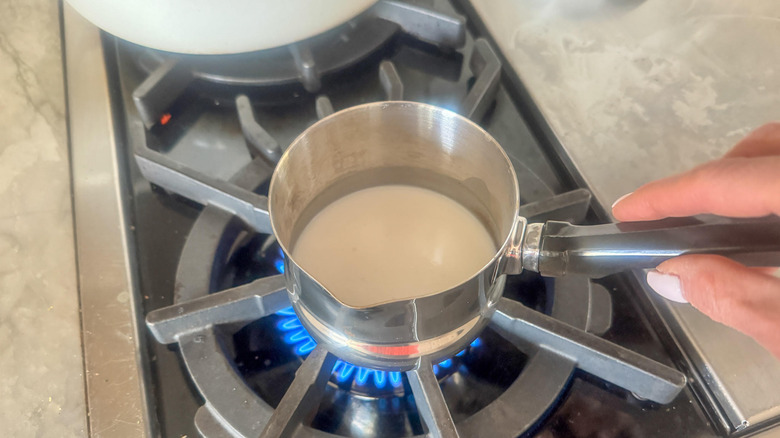 cream in small pot on stove