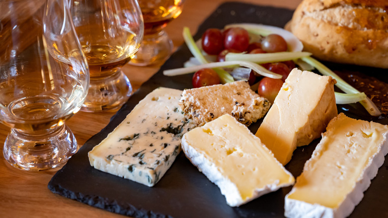 Scotch paired with cheddar, stilton, blue cheese, and brie.