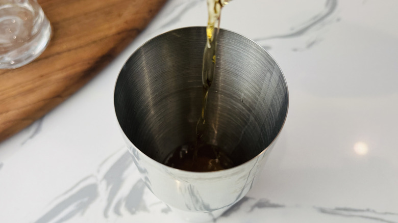 Whiskey sour ingredients in cocktail shaker