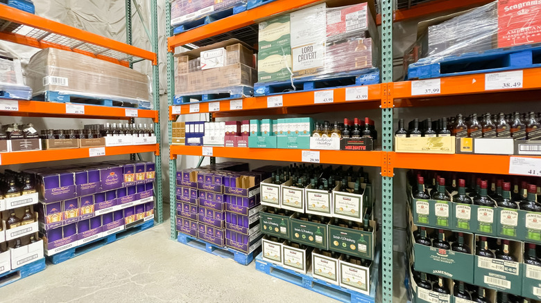 Different whiskeys on display at a Costco warehouse store