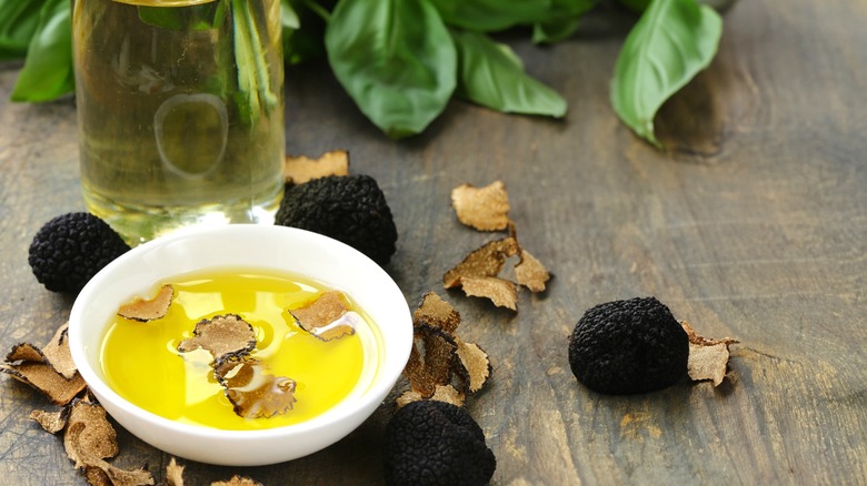black truffle oil with shaved truffles