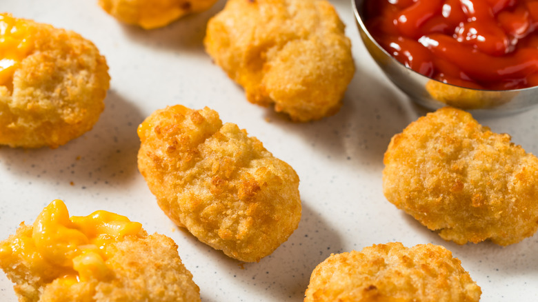 Fried mac and cheese balls with ketchup