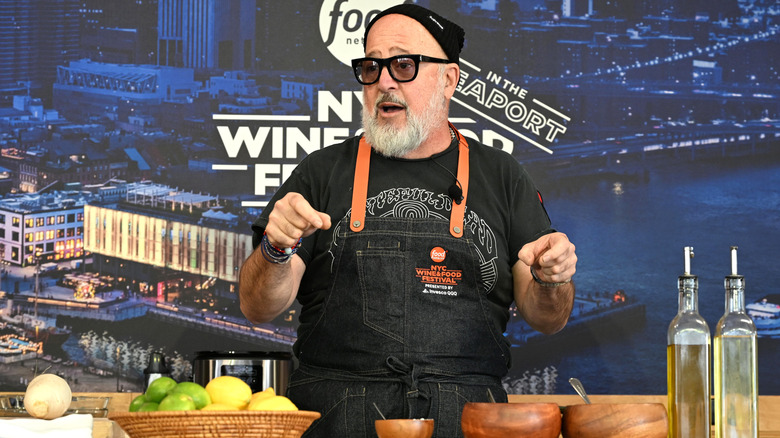 Andrew Zimmern giving a cooking demonstration