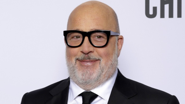 Andrew Zimmern smiling on the red carpet