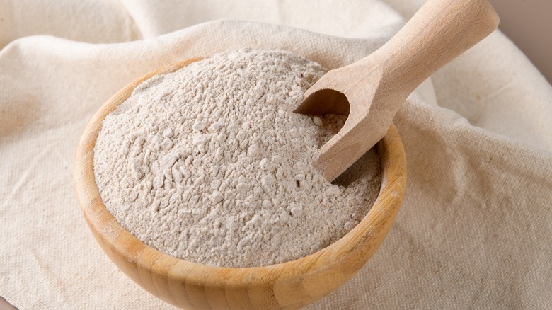 buckwheat flour in a wooden bowl