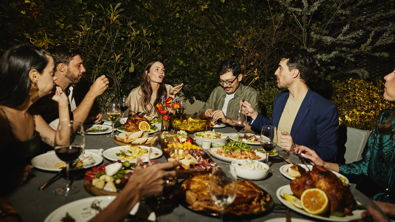 People eating at dinner table