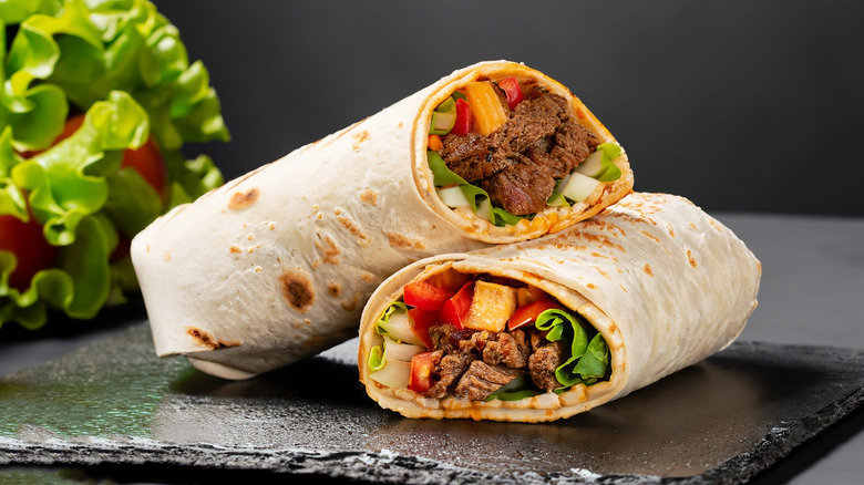 Beef burrito sliced in half