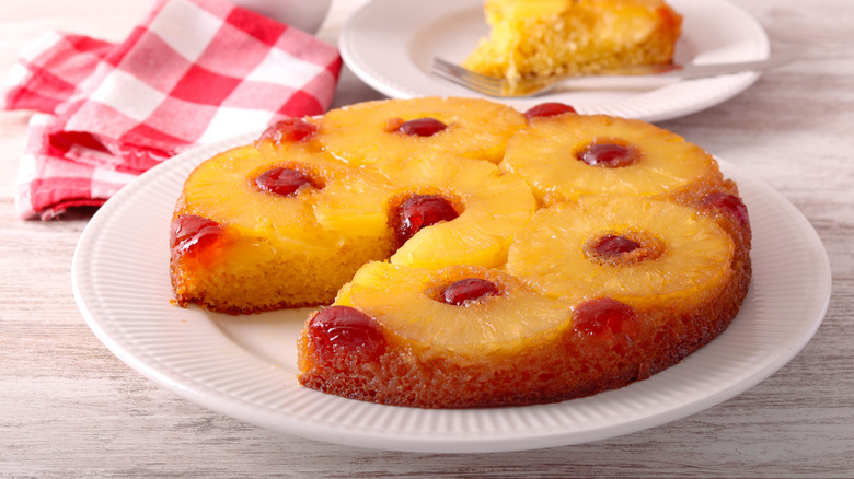Pineapple upside down cake on a white plate