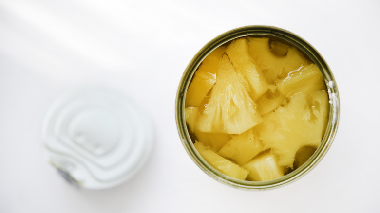 An open can of pineapple chunks