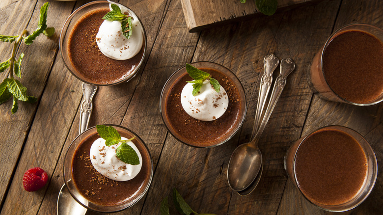 Various bowls of chocolate mousse