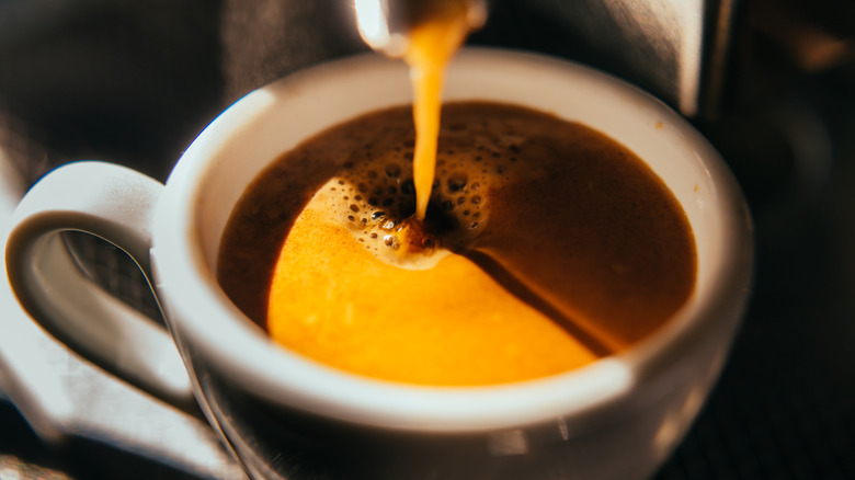 An illustrative image showing a closeup of a fresh espresso shot.