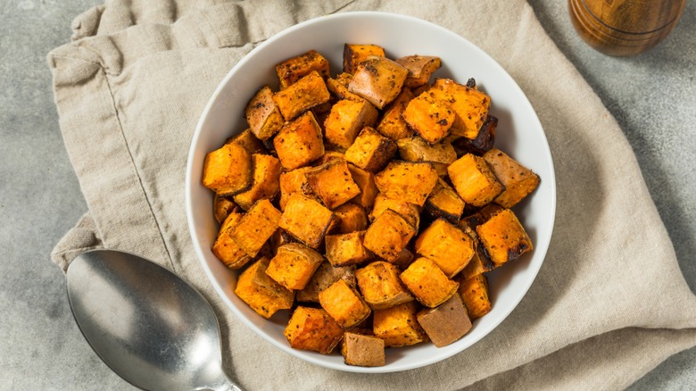 A bowl of roasted diced sweet potatoes