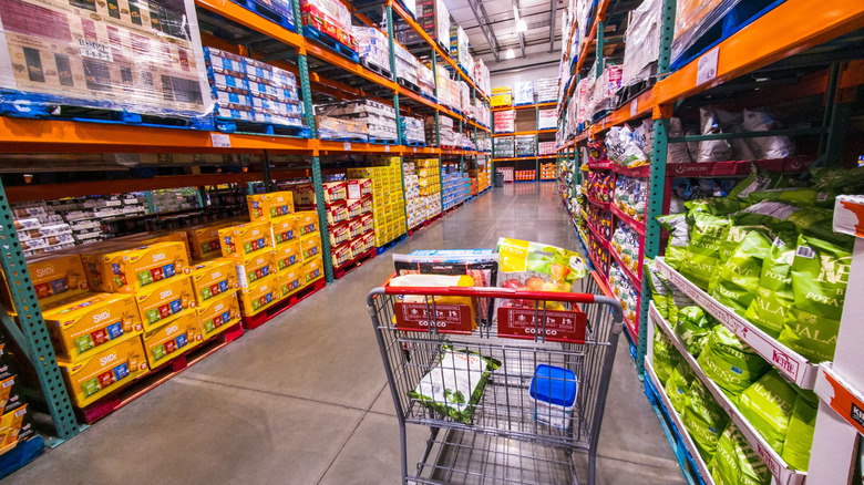 Shopping cart in a snack aisle of Costco.