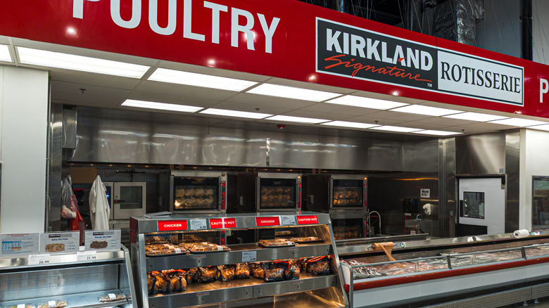 Costco's poultry aisle with fresh rotisserie chicken is displayed front and center, while raw options are stored alongside it