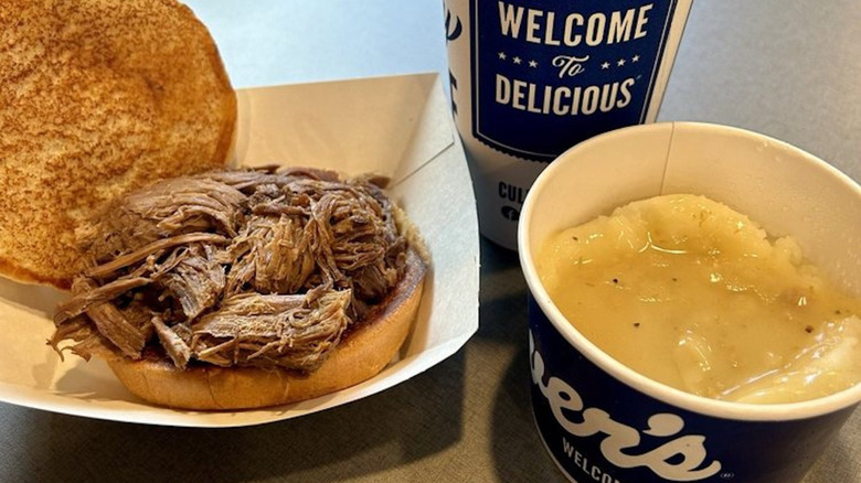A barbecue sandwich, mashed potatoes, and drink from Culver's