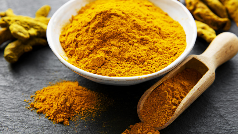 A bowl of ground yellow spice.