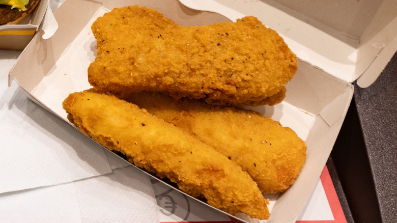 close up of McDonald's chicken strips in a box